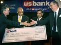 Cal State Fullerton, Pres. Gordon accepts check from US Bank reps