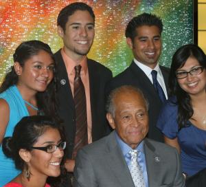 Hispanic students congratulate President Gordon on award.