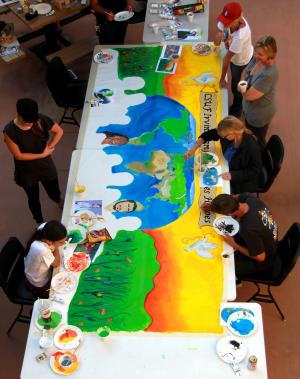 students paint a mural