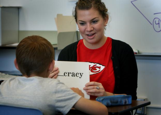 Credential student Jill Pasker works face-to-face with a student
