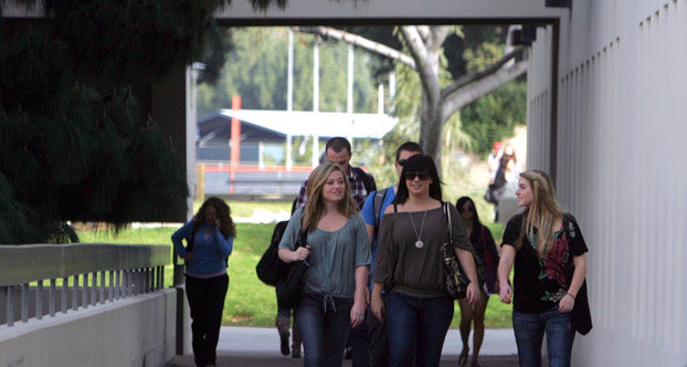 students walking across campus