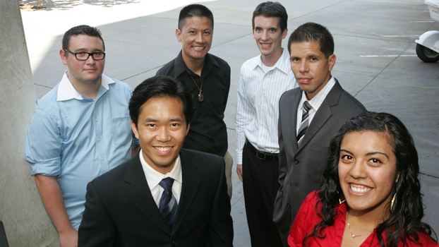This year's CSUF California Pre-Doctoral Scholars — two in front and four behind in semi circle.