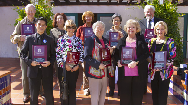 This year's Volunteers of the Year stand outside the Golleher Alumni House at Cal State Fullerton.
