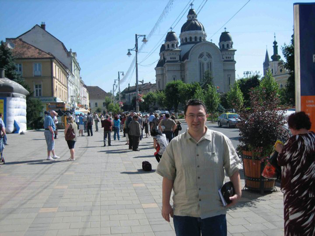 Bogdan Suceava walking down a street in the town of Targu Mures, Romania.