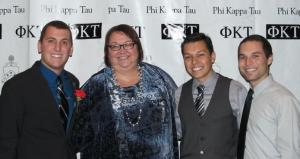 CSUF students Andrew Lopez, Henoc Preciado, Joseph Lopez, from left, with Kandy Mink Salas, associate vice president for student affairs, attended the 50th anniversary celebration of the Gamma Omicron Chapter of Phi Kappa Tau.