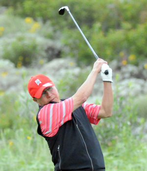 golfer follows through on his golf swing