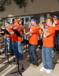 Members of the band perform at the homecoming tailgate.
