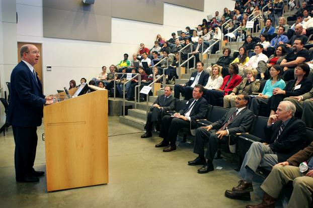 Lloyds chairman Peter Levene speaks before an audience in Mihaylo Hall's large tiered lecture hall