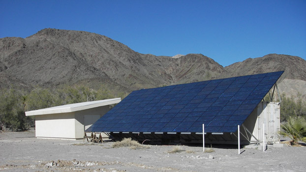 an array of ground-level solar panels at the Desert Studies Center in Zzyzx.