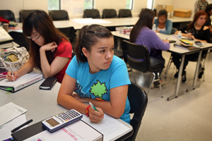 Nicole Arce looks up while working on a calculus problem.