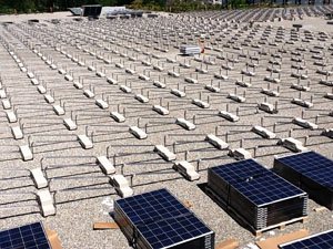 Closeup photo of the framework that will hold the solar panels on the Clayes Center.