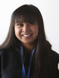 Young woman in a navy blue sweatshirt