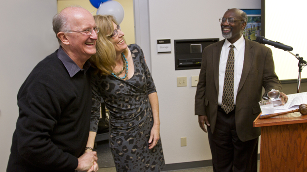 Jack Bedell hugs Andrea Guillaume as Willia Hagan looks on.