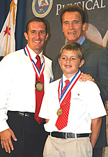 Kurt Suhr with Governor Schwarzenegger and student