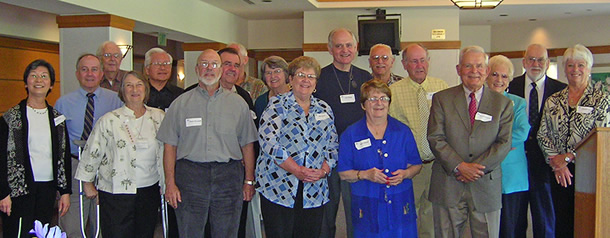 Board members gathering for a group photograph