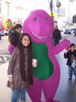 Doreen posing with Barney on a street corner