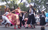 Performers dancing in traditional garb