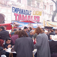 Fair attendees crowd around food vendors