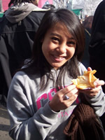 Doreen presenting a small star-shaped pastry