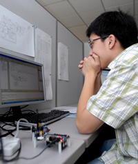 Ivan Check at a computer workstation