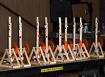 Trebuchets from the MESA competition lined up on a table