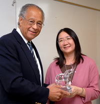 President Gordon and Outstanding Professor recipient Stella Ting-Toomey