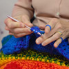 Women crocheting blankets for charity