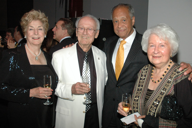 Jim Young and President Milton A. Gordon, center, with patrons