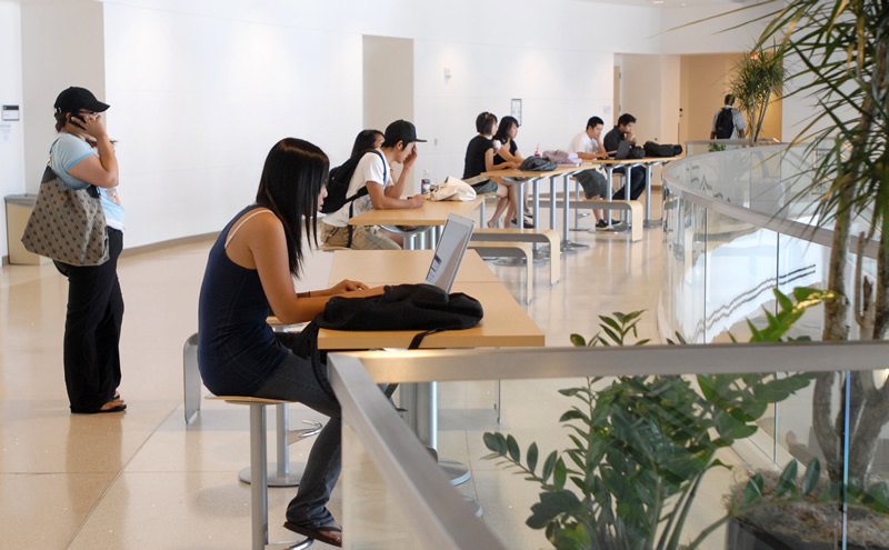 Students studying from seats on the second floor of Mihaylo Hall