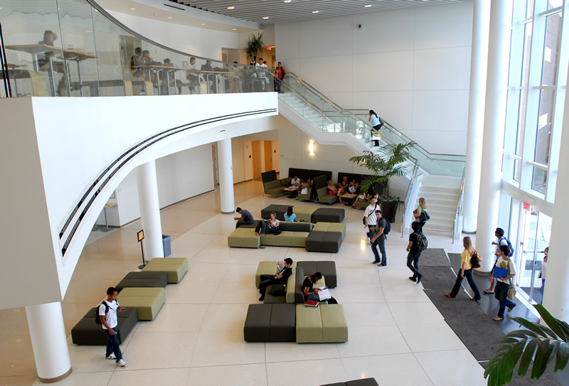 Students studying and chatting from the entry lounge of Mihaylo Hall