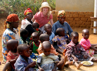 Brackett with mothers and children