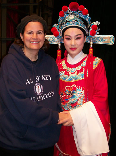 Nancy Snow with opera star in "water wing" costume