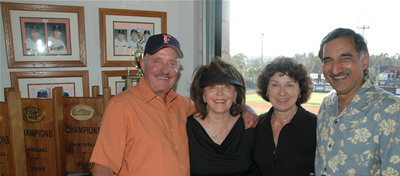 Alumnus James D. Woods (B.A. business administration) and his wife, Jeanette, join Anil Puri, dean of the College of Business and Economics, and his wife, Sharon