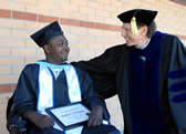 Former athlete star Rodney Anderson with Jeffrey Kottler, chair and professor of counseling