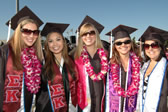 Graduates from the Sigma Kappa sorority pose during the commencement ceremonies