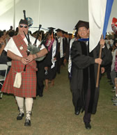 The traditional bagpip leads the graduates from the College of Engineering and Computer Science