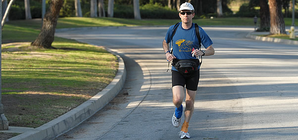 A. Scott Hewitt running in a residential neighborhood