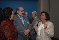 Civil rights activist Sylvia Mendez talks animatedly with other conference participants