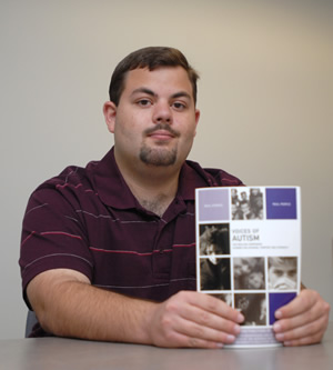 Brian Lafferty holding a magazine