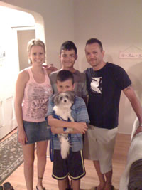The McCafferty family reunited with their dog Tinkerbell.