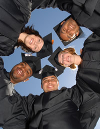 Graduating Guardian Scholars in caps and gowns