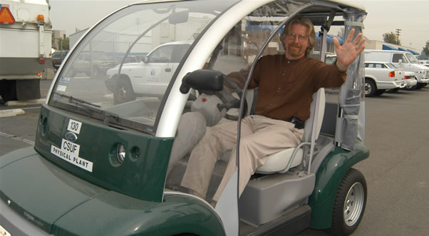 Van der pol riding in electric car on campus