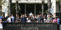 Program participants pose in front of Langsdorf Hall during a campus visit.