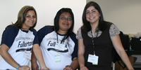 Cal State Fullerton students and program office manager volunteer at one of the parent workshops.
