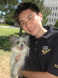 Biology major Robert Tran with Tinkerbell.