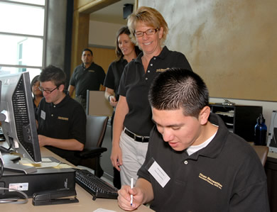 Andrea Willer oversees sign-ups in early March.