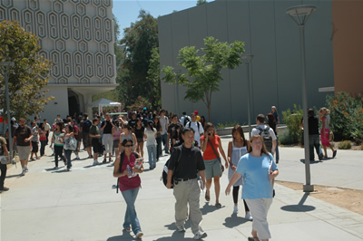 Students strolled along the pathways between the Pollak Library, the Performing Arts Center and Titan Shops.