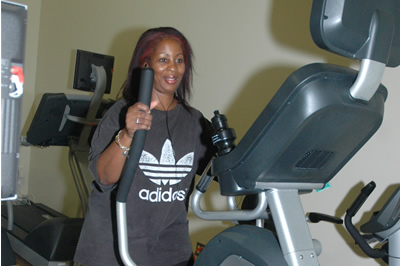 During Rec Fest Thursday, Aug. 23, members of the campus community were invited to visit the new Cardio Studio located in Room 264 of the Kinesiology and Health Science Building. Pictured using the facilities is Edna Turnbow, administrative analyst in the College of Business and Economics. 
