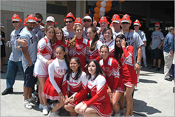 Fullerton High School cheerleading squad and Titans team members