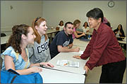 Mei Bickner discusses with her students